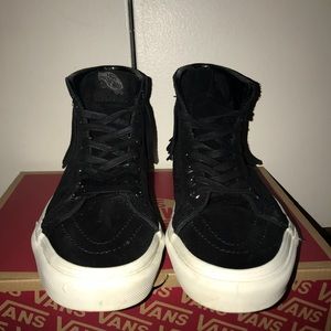 Black high top fringe vans